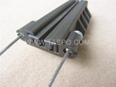 Fiber optic clamp anchoring UV protection